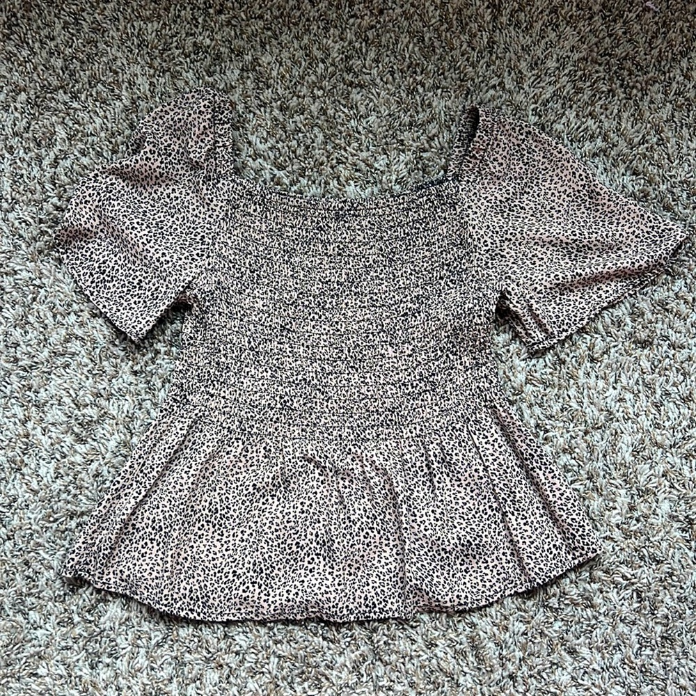 Cut cheetah top from urban romantics , size small no tears and stains